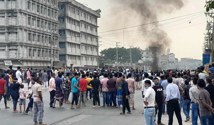 Vehicular movement halted in Gazipur, vehicle set ablaze as workers protest