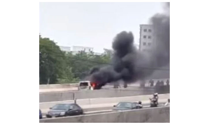 Private car catches on flyover near Dhaka airport