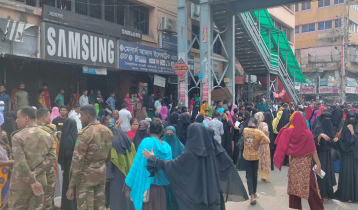 Garment workers block Mirpur roads demanding due salaries