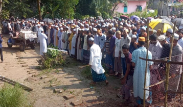 Tofazzal laid to rest beside brother